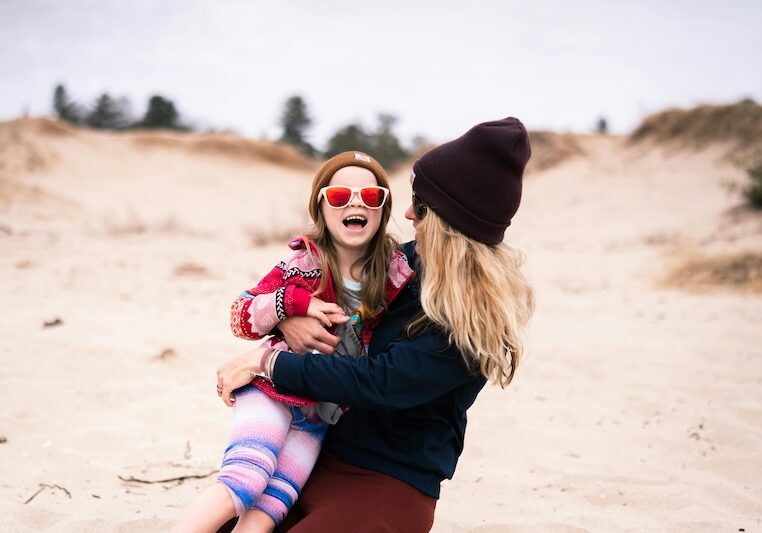 Woman and child outside in Indiana Dunes National Park.